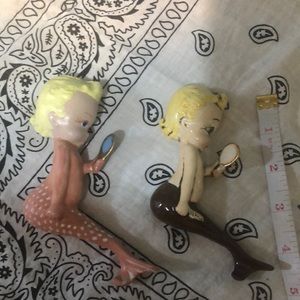 Two. Ceramic mermaids.